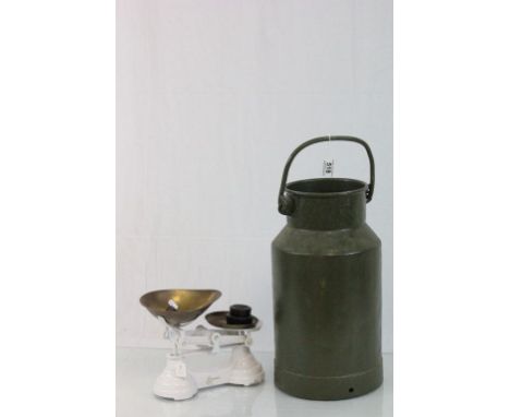 A vintage Dutch milk churn together with a pair of scales with weights 