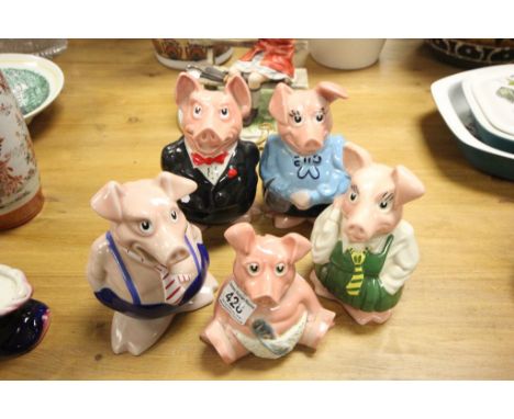Group of five Wade ceramic Natwest Pig money boxes