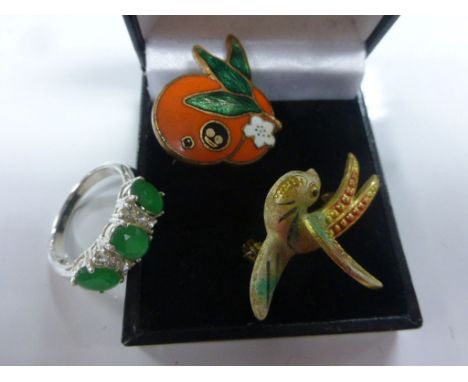 Two enamel set vintage brooches and a silver and cz dress ring 