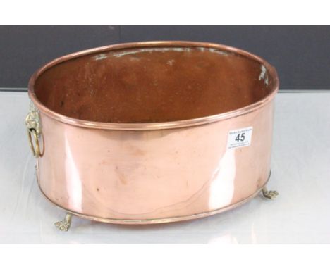 Copper Oval Planter with Brass Lion Mask Ring Handles and Brass Paw Feet