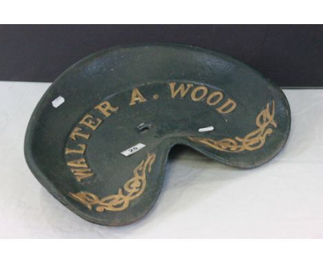 Painted cast Iron Tractor seat, marked Walter A Wood