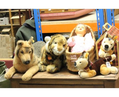 Four vintage Steiff animals, one with cardboard carry box  and a vintage Doll with "Schutz Marke" to back of head