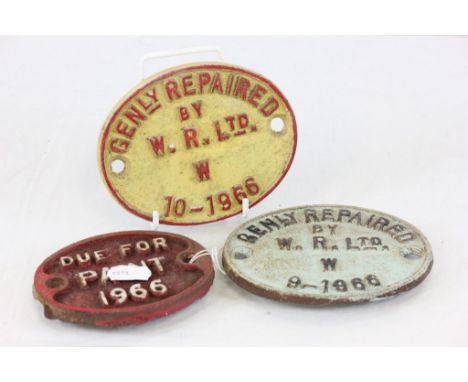 Three vintage Cast Iron Railway wagon plaques, one marked "Due for Paint 1966", the other two "Genly Repaired by W.R Ltd 1966
