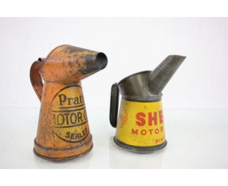 Two vintage motor oil cans Shell and Pratts.
