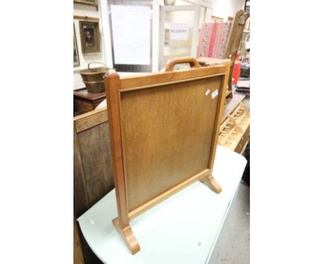 A Colin Beaverman Almack wooden firescreen with solid panel &amp; carved beaver to top