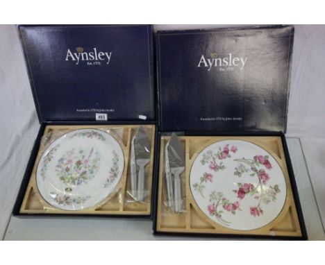 Two boxed Aynsley ceramic Cake/Cheese stands with stainless steel cutlery etc in Wild Tudor & Eliz. Rose patterns