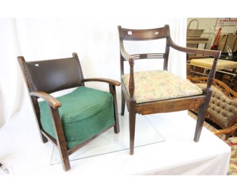 Mid 20th century Low Oak Elbow Chair with label ' Beehive Warehouse, Birmingham ' together with a Regency Style Commode Elbow