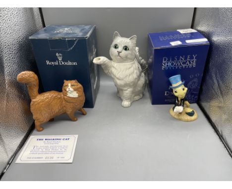 Boxed Royal Doulton - The Waling Cat, Boxed Royal Doulton - Jiminy Cricket, and Beswick England - Cat Teapot
Good condition, 