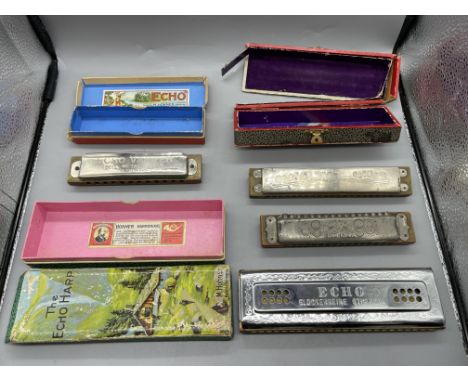 Four Vintage Harmonicas 
