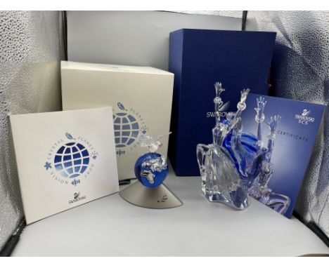 Boxed Swarovski Crystal Magic of Dance Isadora-2002, and Boxed Swarovski Crystal Planet Vision 2000
Good condition, no damage