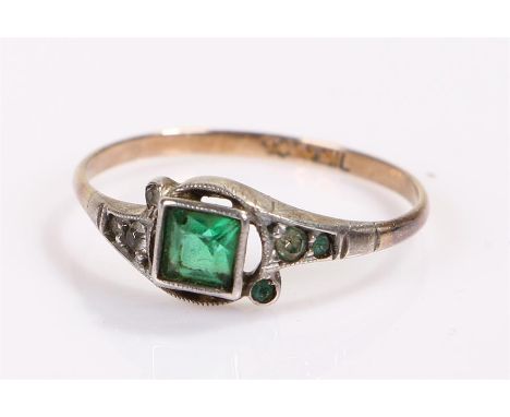 9 carat gold ring, with a green stone set in a silver head, ring size O