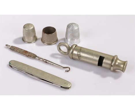 The Metropolitan whistle, together woth a Thomas Bulman & Co knife, a Johnson & Johnson pure tea advertising button hook, tog