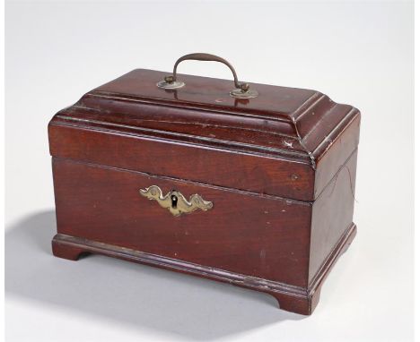 George III mahogany tea caddy, the rectangular top with a swing handle above the shaped edge above the rectangular base and b