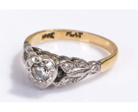 18 carat gold diamond set ring, the heart shaped head with a central round cut diamond, ring size K