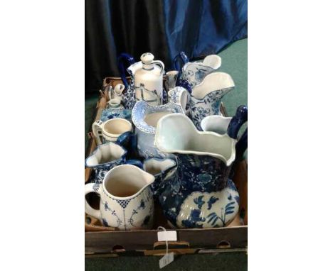 A collection of jars and jugs in blue and white together with a small quantity of ceramic wall tiles, (Qty)