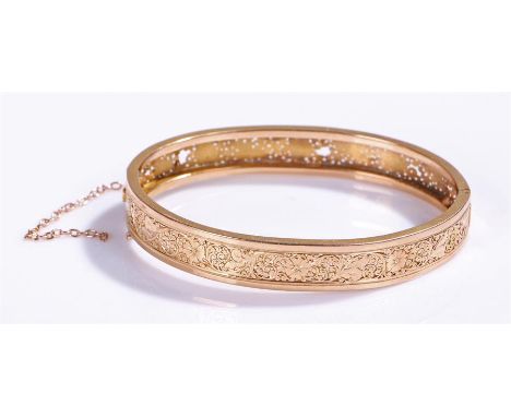 Gold bangle, with pierced foliate decoration, AF, 11.7 grams