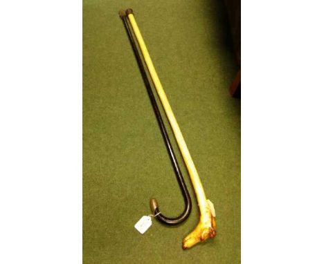 Crook topped walking stick with white metal finial, together with another walking stick with carved dogs head handle, (2)