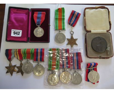 Ten unnamed WWII medals, a boxed faithful service medal to Rebecca Hatton Wilkinson and a 1926 National Emergency medallion 