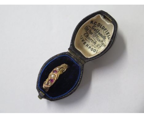 A hallmarked 15ct yellow gold ruby and pearl ring, size Q, approx 2.6 grams, some small wear but generally good 