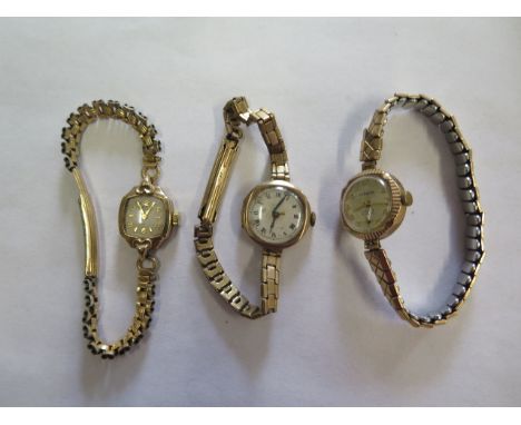 Three 9ct yellow gold manual wind ladies watches all on plated straps and all not working, total weight approx 47 grams 