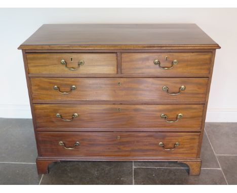 A Chippendale period-George III circa 1775- mahogany chest of drawers standing on original bracket feet, the drawer sides are