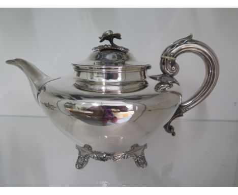 A William IV silver teapot with floral knob and scroll handle, Charles Fox II London 1834, 27cm long x 15cm tall, approx 21.6