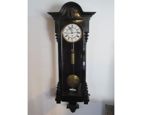 An 8 day single weight Vienna wall clock - Height 114cm - in generally good condition, running 