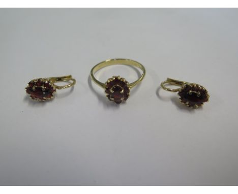 An 18ct yellow gold garnet cluster ring, size P, and a pair of matching earrings, total weight approx 5.9 grams, all in good 