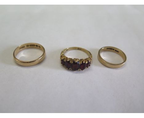 Two hallmarked 9ct yellow gold rings and another 9ct ring, sizes O/R/P, total weight approx 9.4 grams, generally good some us