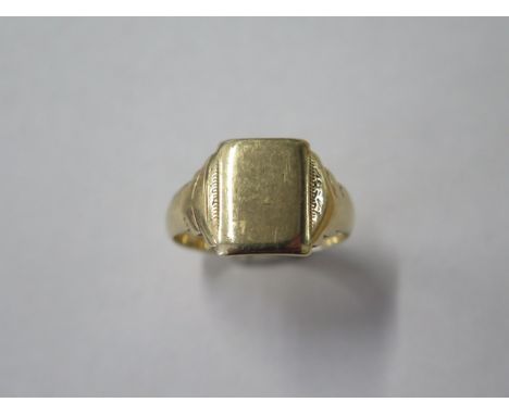 A hallmarked 9ct yellow gold signet ring, size Q, some wear and bending, approx 4.2 grams 