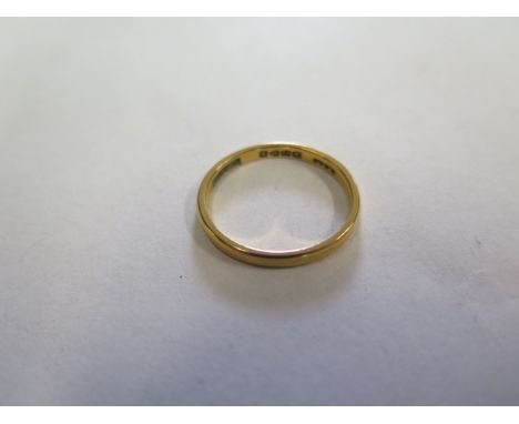 A 22ct hallmarked band ring, size M, approx 2.8 grams, slight bending otherwise generally good 