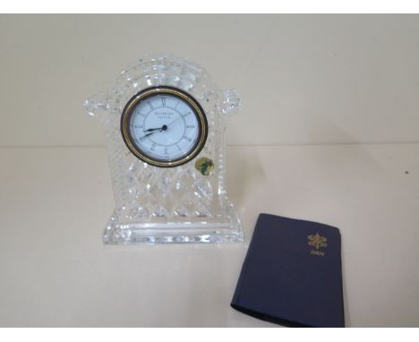 A Waterford crystal mantle clock, 18cm tall, with instructions, dated 2004 in good condition , working with new battery 