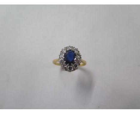 An 18ct gold and platinum sapphire and diamond cluster ring, size R, approx 3.9 grams with 10 diamonds each approx 0.10ct sur