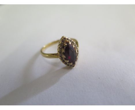 A hallmarked 18ct yellow gold garnet ring, size P, approx 3.7 grams, generally good some wear to garnet 