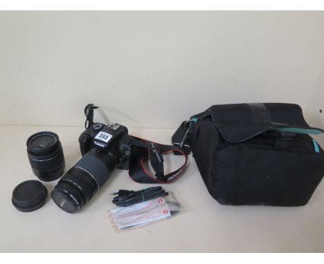 A Canon EOS 1100D digital SLR camera with a Canon zoom lens EF 75-300mm 1:4-5.6111 lens and a Canon zoom lens EF-S 18-55mm 1: