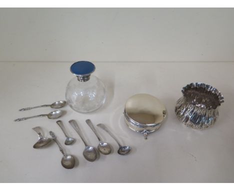 A silver trinket box, a silver bark effect bowl 7cm tall, a silver and enamel top sent bottle and assorted silver flatware, w