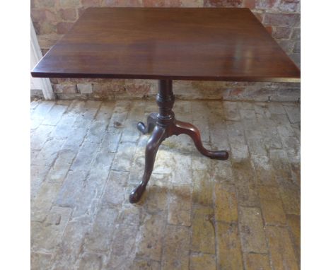A Georgian and later tilt top tripod table with a one piece rectangular top 69 cm tall 69 x 79