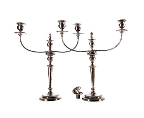 PAIR OF 19TH CENTURY SILVER PLATED CANDELABRA, of Neoclassical form, the twin branches with urn form nozzles above fixed drip