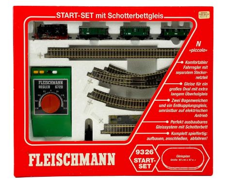 Fleischmann "N gauge" start set No. 9326 Comprising a boxed 0-6-0 tank engine No. 80030 plus three green carriages, various t