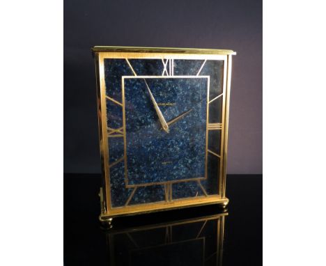 A Jaeger LeCoultre brass and lapis lazuli electric mantel clock. Workings by UTS Germany 01248 Numbers inscribed 3829 5005