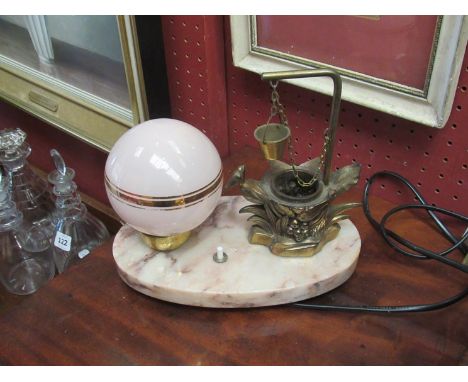 A 1930's marble lamp base with glass dome and a brass well with bird and bucket detail, 23cm long