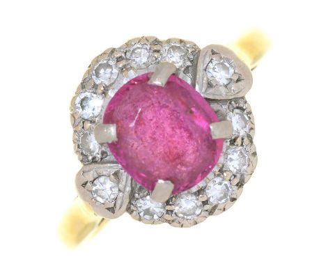 A RUBY AND DIAMOND CLUSTER RING IN 18CT GOLD, THE OVAL RUBY APPROX 7 X 6 MM, TOWN AND DATE MARKS RUBBED, 3.3G, SIZE I  RUBY F