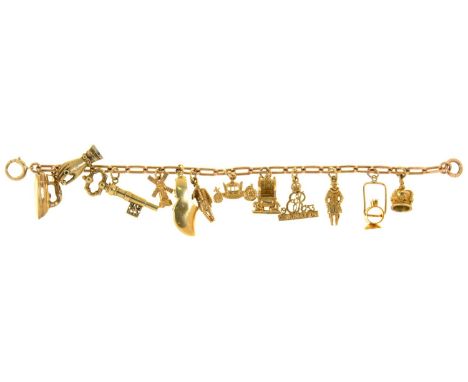 A GOLD BRACELET, WITH SEVEN GOLD CHARMS, MARKED 9CT, 375 OR UNMARKED, 32G  LIGHT SURFACE WEAR CONSISTENT WITH AGE AND USE