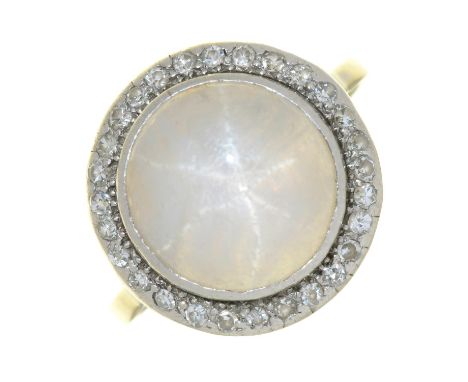 A STAR MOONSTONE AND DIAMOND RING IN WHITE GOLD, MOONSTONE CABOCHON APPROX 12 MM DIAM, UNAMRKED, 6.5G, SIZE R ½  LIGHT SCRATC