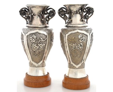 A PAIR OF CHINESE SILVER VASES, 17 CM H, WITH SILVER GILT DECORATION, MARKED IN CHINESE, OM FIXED WOODEN STANDS  GILT WORN. O