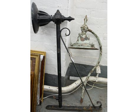 A BLACK PAINTED CAST IRON LANTERN BRACKET, 110CM AND ANOTHER, SIMILAR, EARLY 20TH C