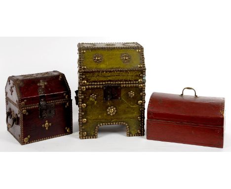 TWO CLOSE NAILED RED OR GREEN LEATHER COVERED WOOD CASKETS AND A MAROON LEATHER COVERED TRUNK, BRASS HANDLED TRUNK 30CM L  