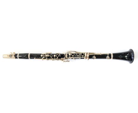 A BUFFET B12 CLARINET AND MOUTHPIECE  