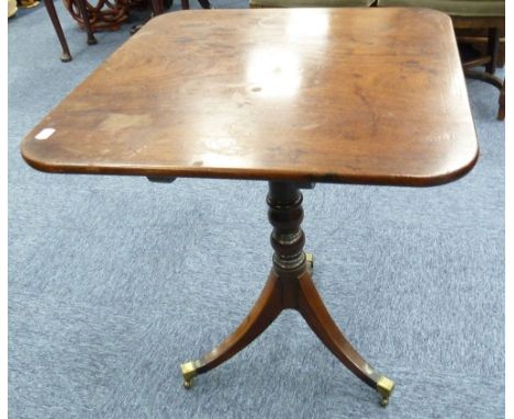 EARLY NINETEENTH CENTURY FIGURED MAHOGANY SNAP TOP OCCASIONAL TABLE,  the rounded oblong top above a slender turned column, a