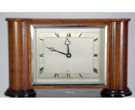 ELLIOTT, ART DECO MAHOGANY CASED MANTLE CLOCK the silvered oblong roman dial powered by spring driven drum shaped movement an
